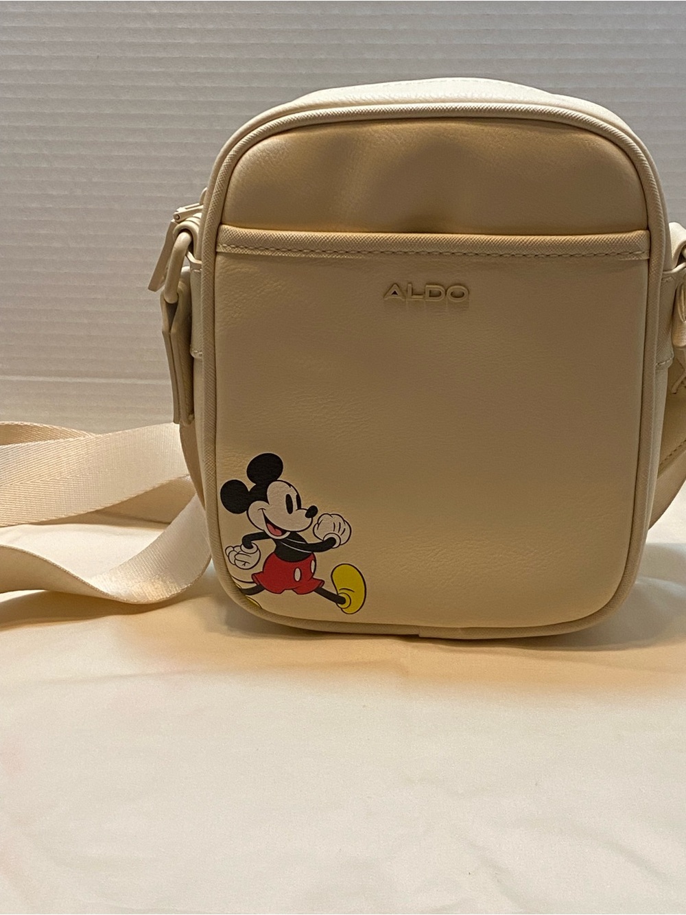 ALDO Cream Messenger Bag with Mickey Print